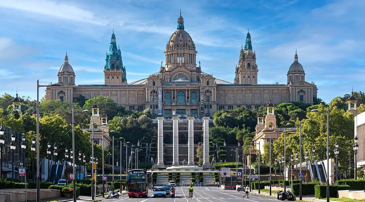 The domed Palau Nacional on Montjuïc above four tall columns and the avenue from Plaça d’Espanya