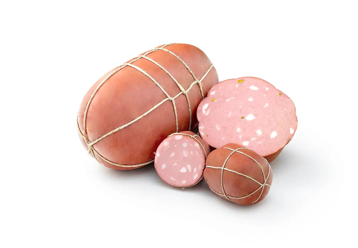Whole mortadellas tied with string, two cut open to show the cubes of fat