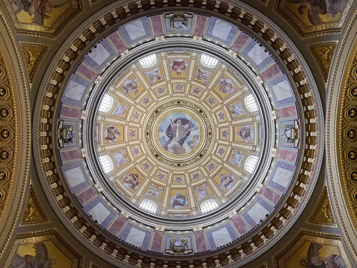 Looking up into the gilded, painted dome of St. Stephen’s Basilica