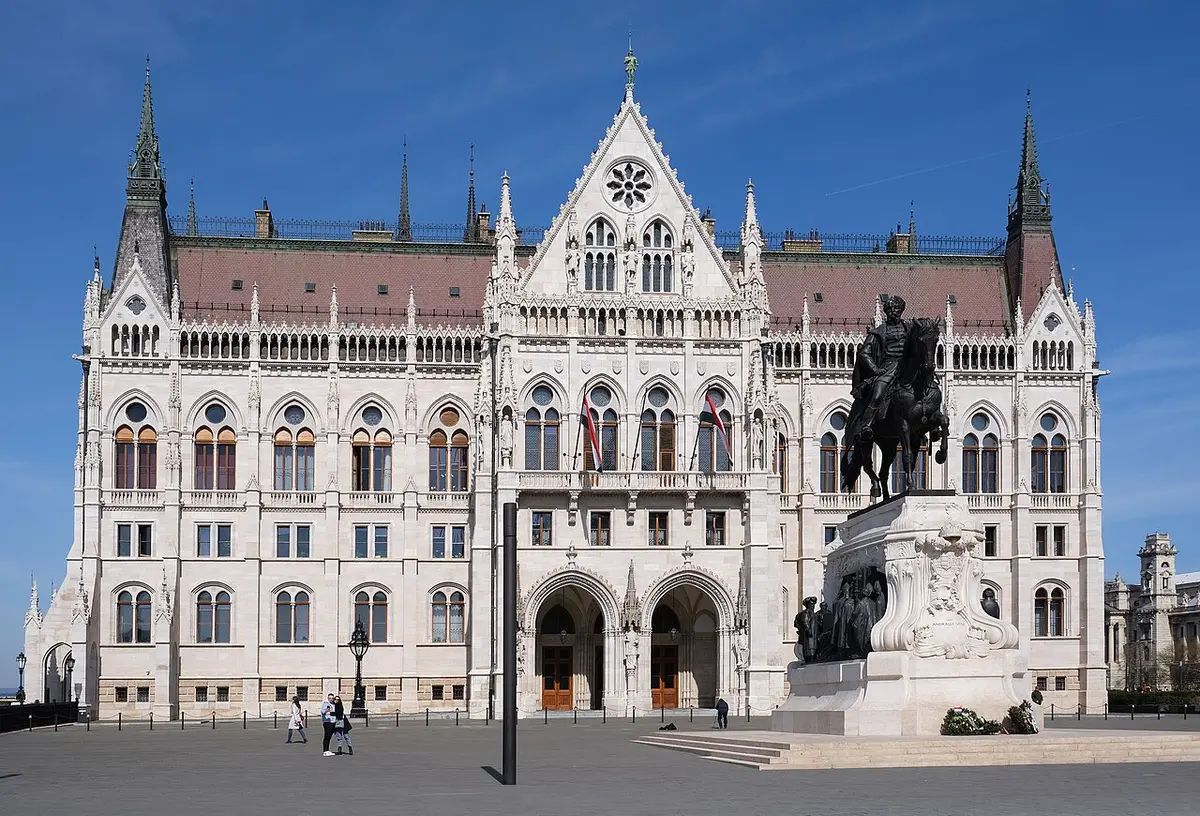 The east front of the Parliament on Kossuth Square, with an equestrian statue in front