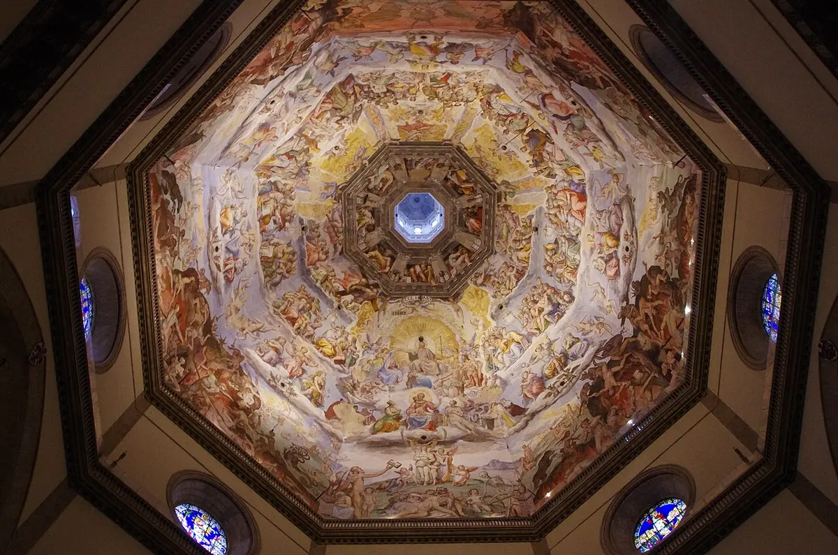 The inside of the cathedral dome, painted with the Last Judgment in rings around the opening at the top