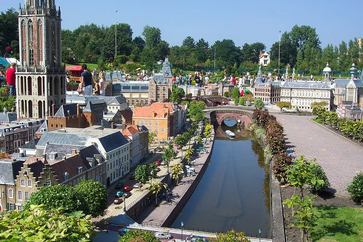 Miniature Dutch town with a canal, church towers and tiny houses at Madurodam