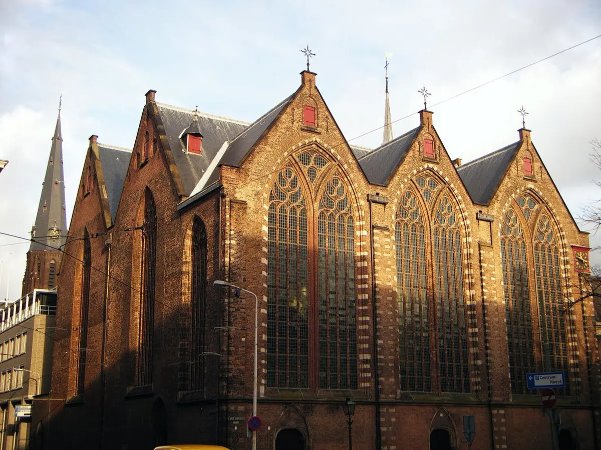 The Gothic brick Kloosterkerk glowing in evening sun