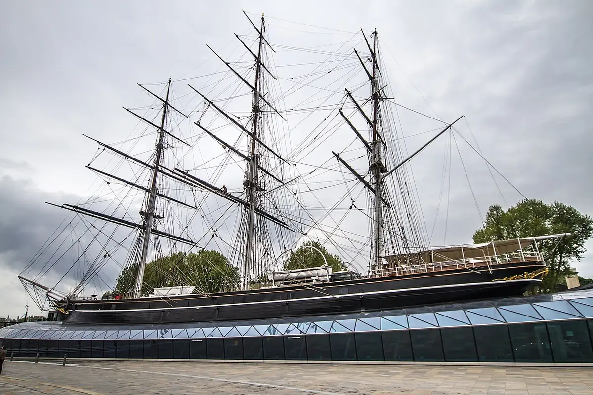 The three masts and rigging of the Cutty Sark above its glass canopy