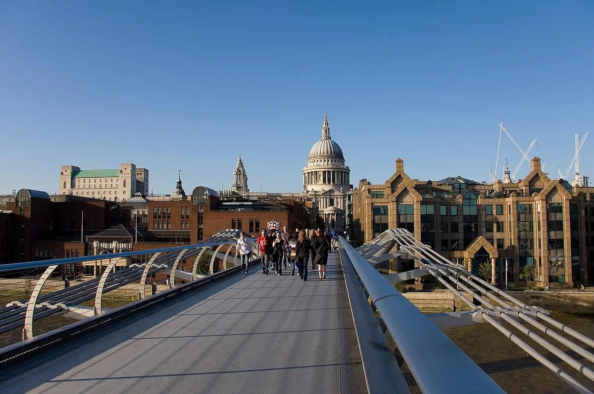 The deck of the Millennium Bridge leading across the Thames to the dome of St. Paul’s