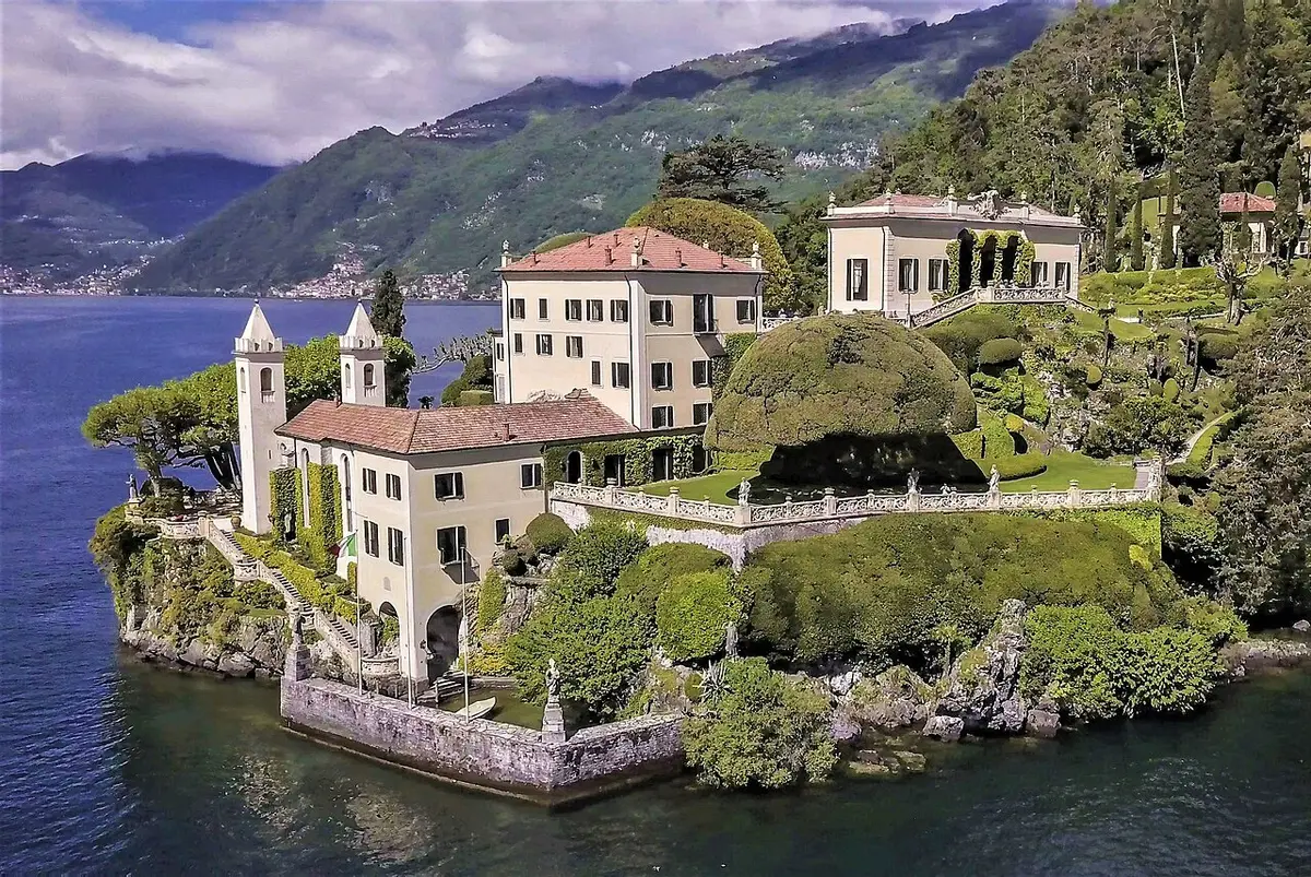 Villa del Balbianello on its wooded point above Lake Como, with towers, terraces and a loggia