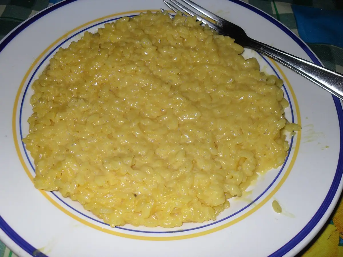 A plate of yellow saffron risotto