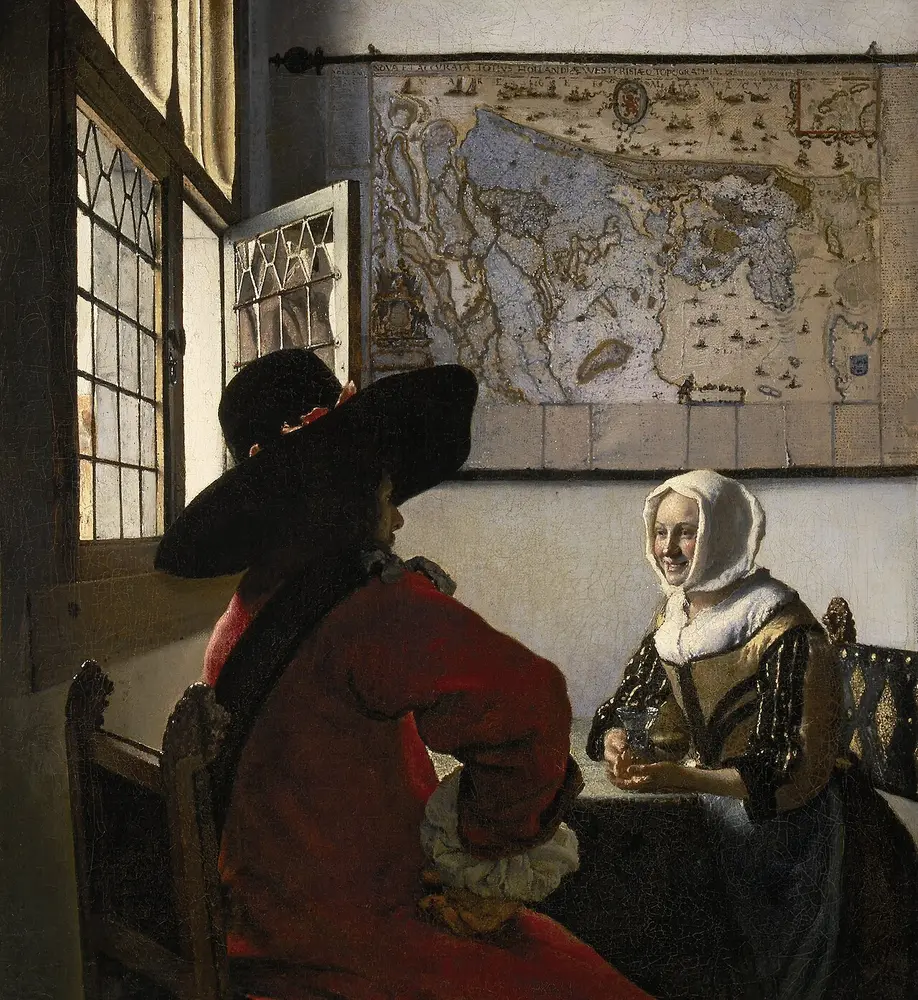 Vermeer painting of a soldier in a red coat and a smiling young woman at a table by a window, a map on the wall
