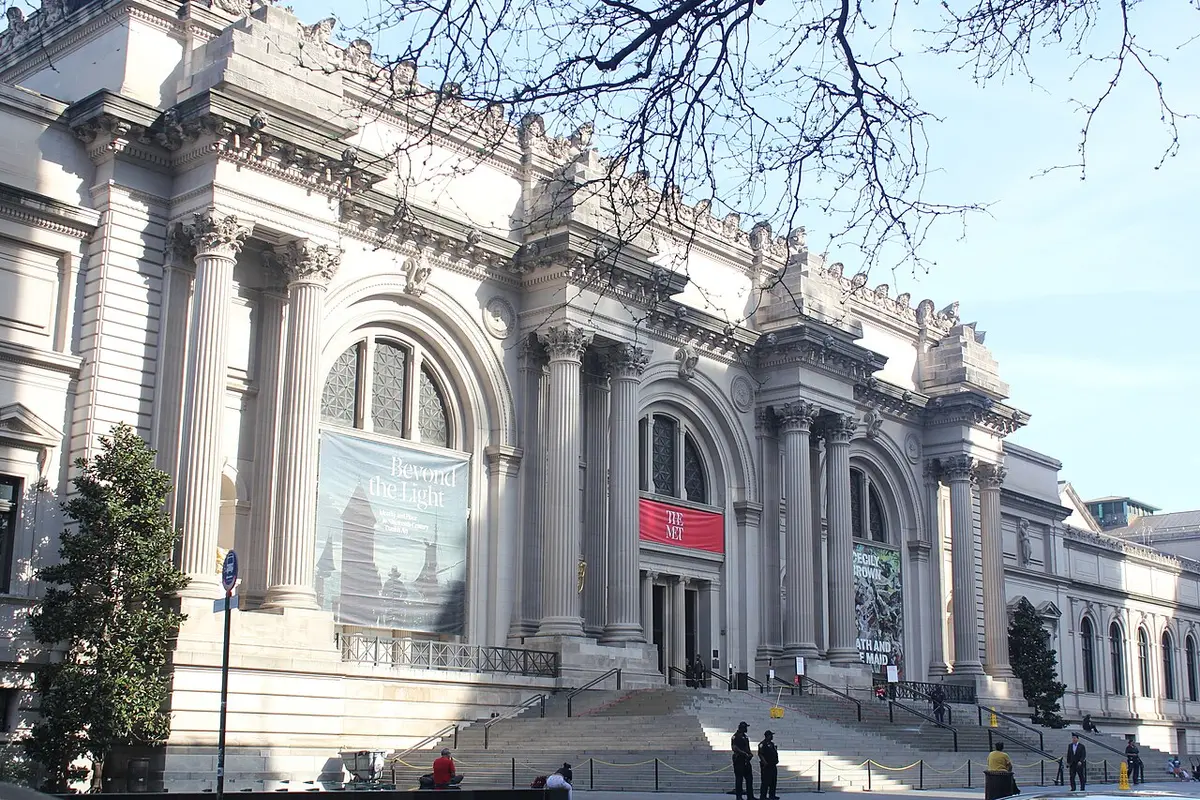 The columned Fifth Avenue front of the Metropolitan Museum of Art above its wide steps