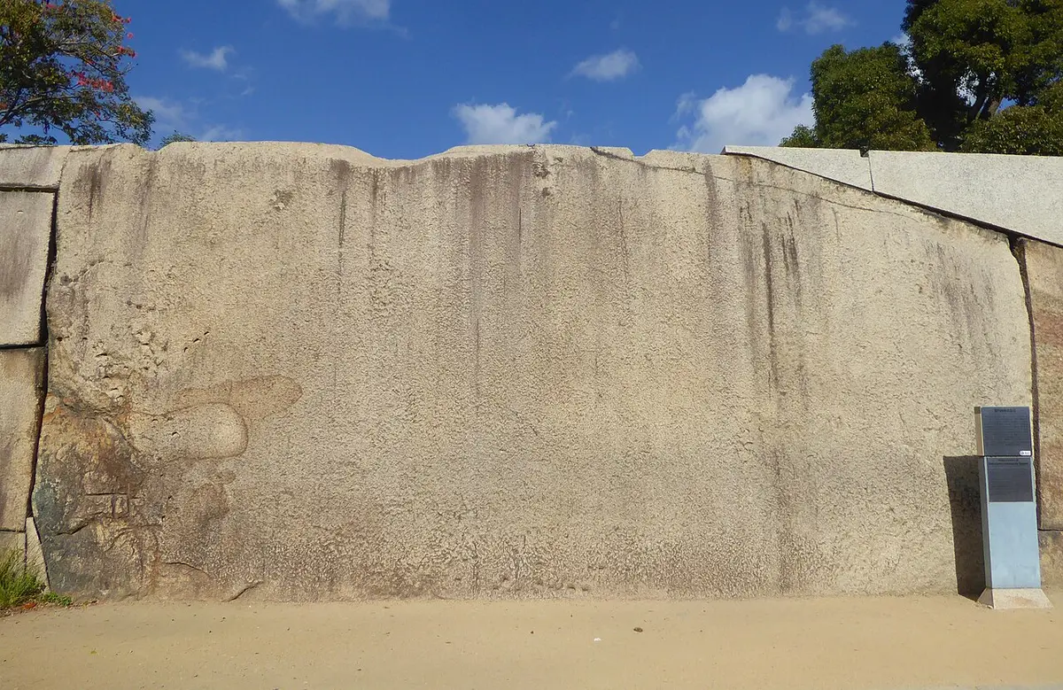 The Takoishi, a huge flat granite block set into the stone wall of Osaka Castle