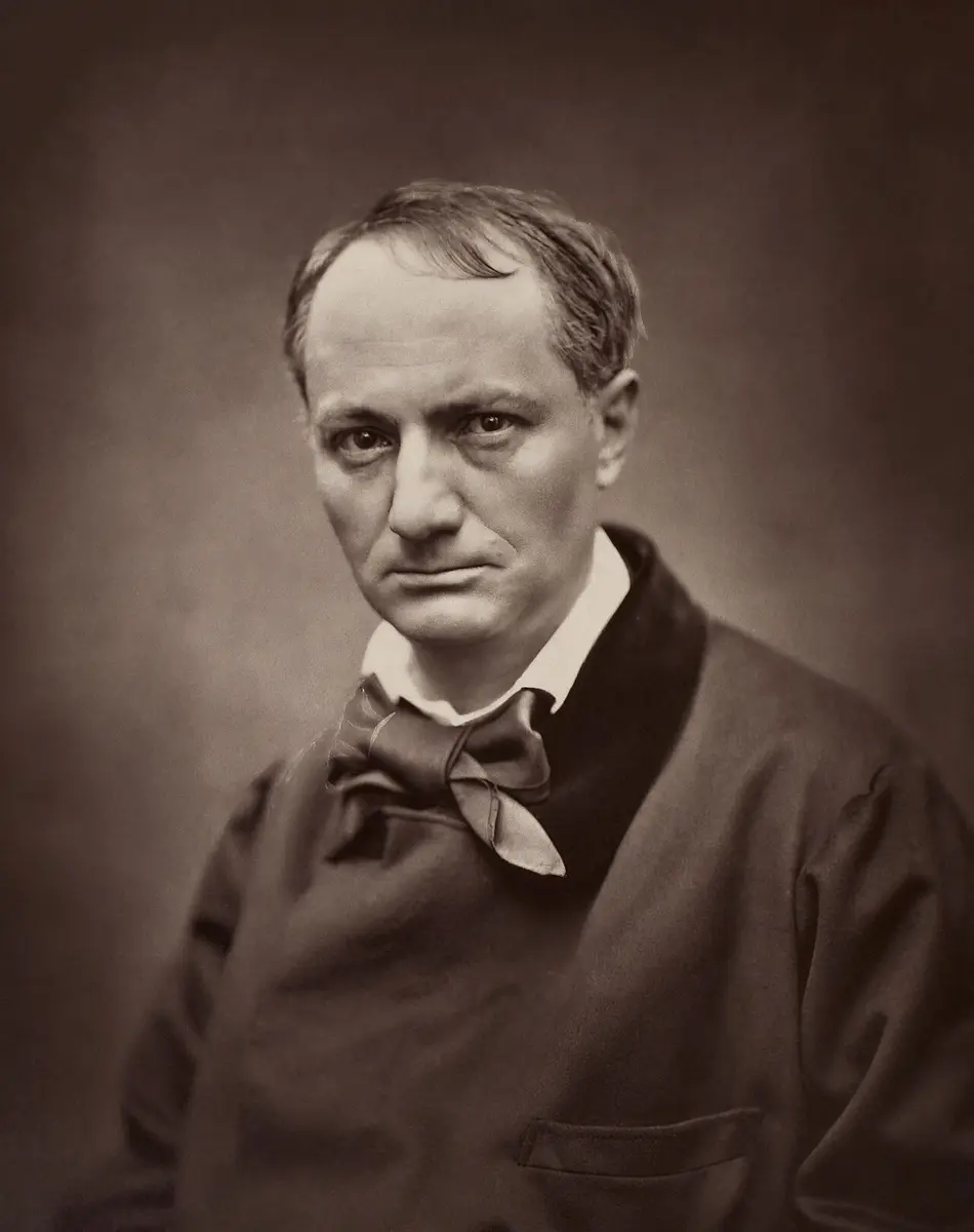 Photograph of Charles Baudelaire in a dark coat and a loose bow tie