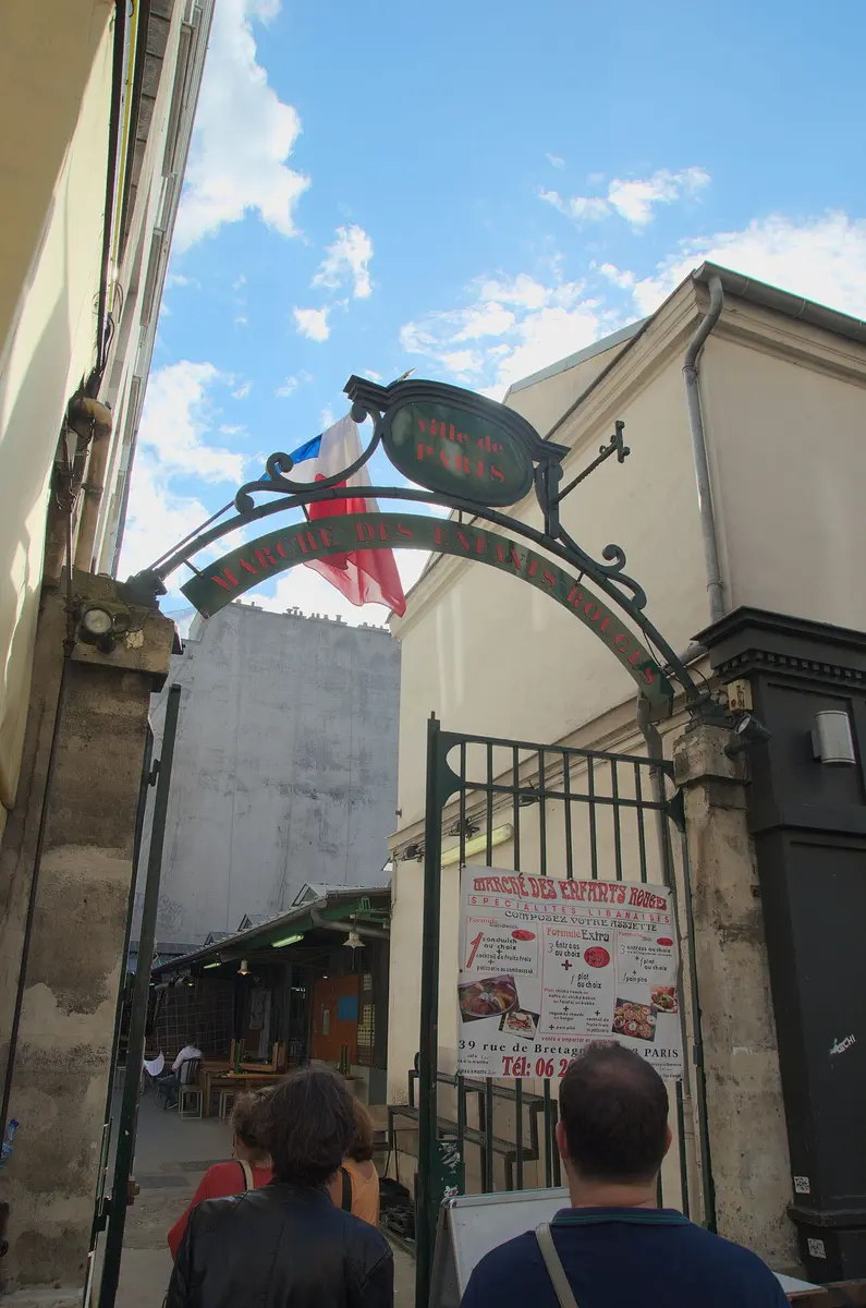 The iron entrance arch of the Marché des Enfants Rouges on the Rue de Bretagne