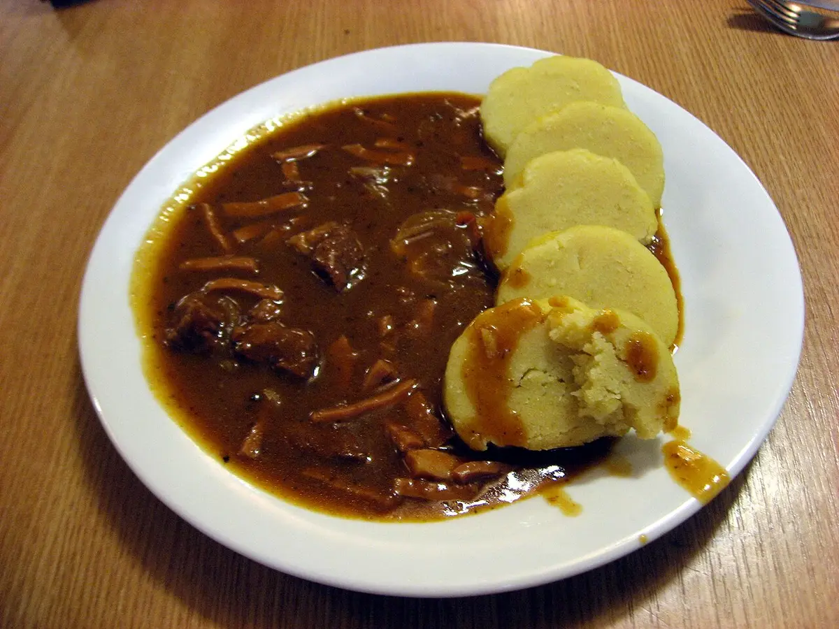 Beef goulash with slices of potato dumpling