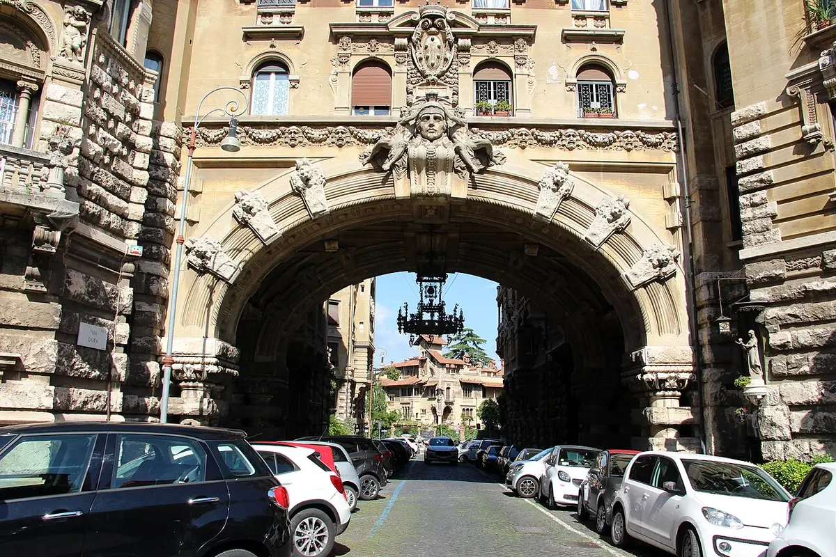 The arch and chandelier at the entrance to Quartiere Coppedè