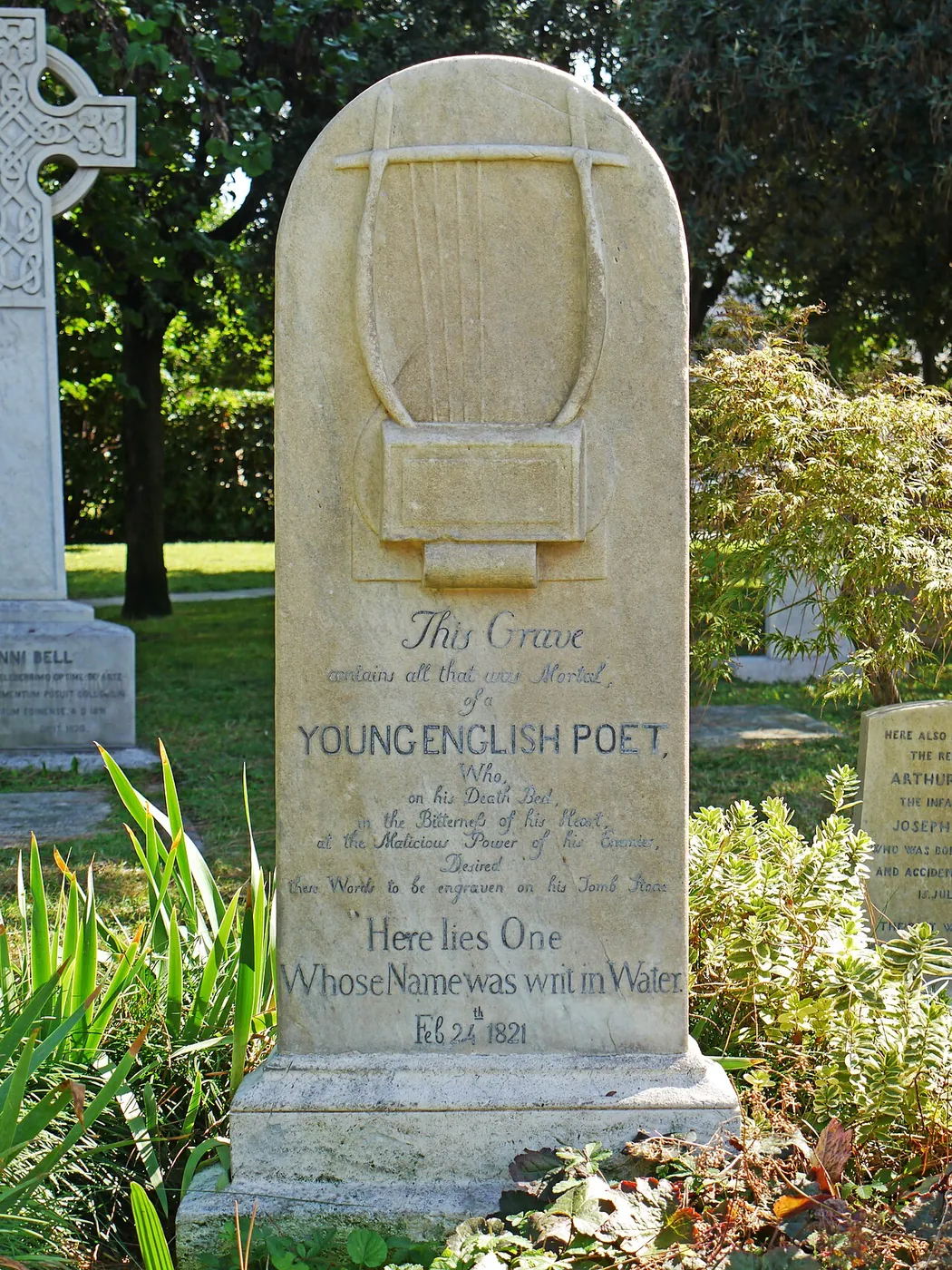 Keats’s gravestone with a carved lyre in the Non-Catholic Cemetery