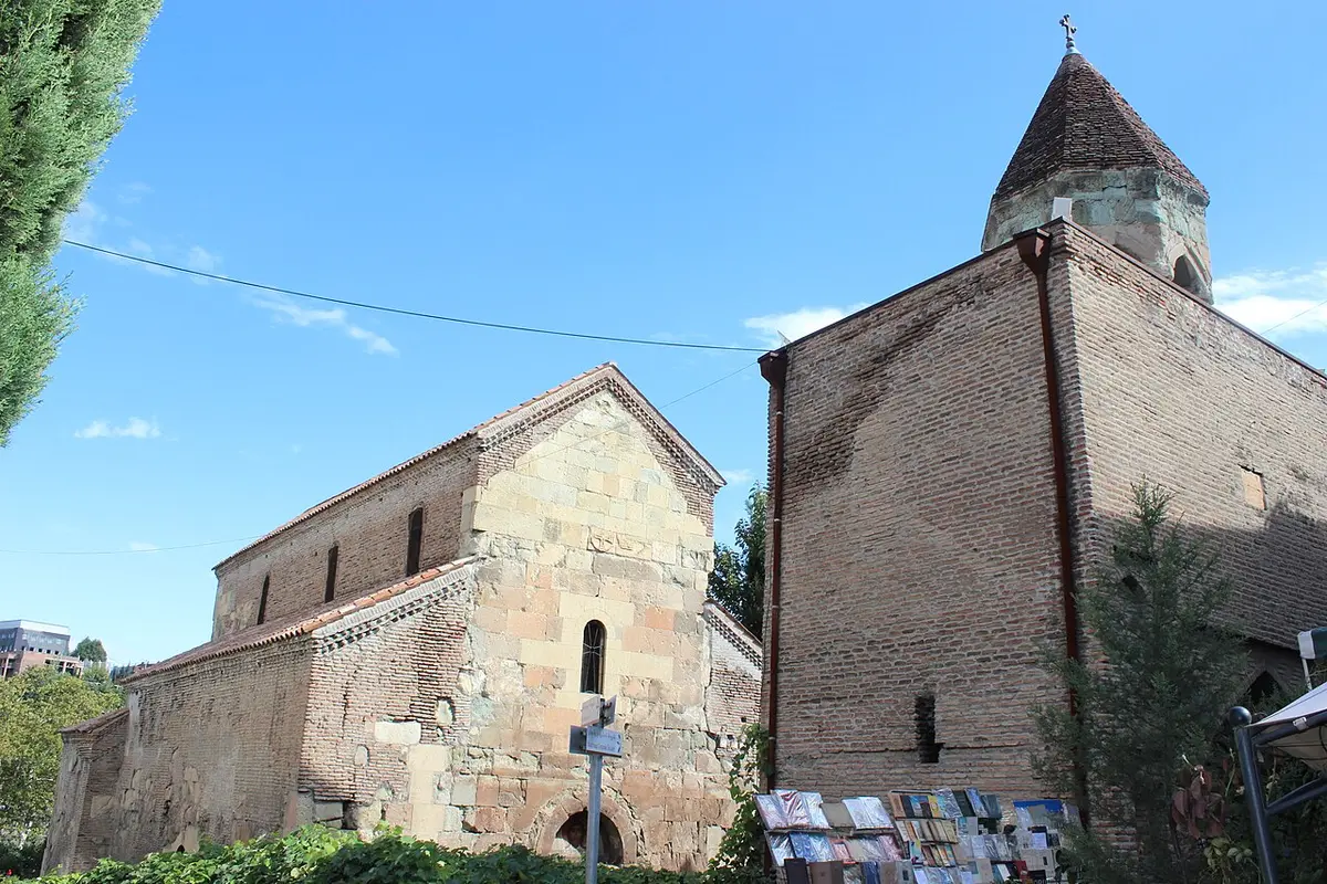 Anchiskhati Basilica, a small stone church, beside its brick bell tower