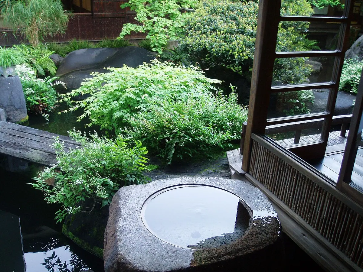 A water garden of stones and ferns in the courtyard of the Asakura Museum of Sculpture