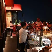A rooftop bar at night